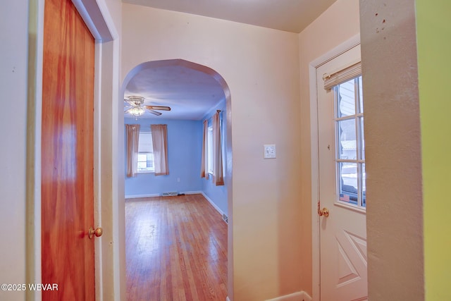 entryway featuring ceiling fan and light wood-type flooring