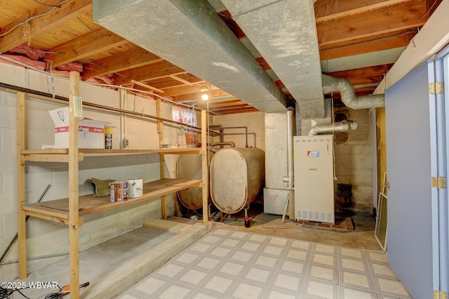 basement featuring heating unit