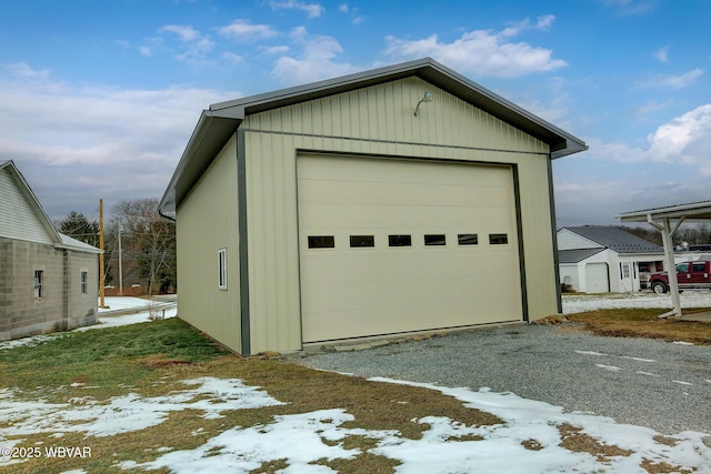 view of snow covered garage