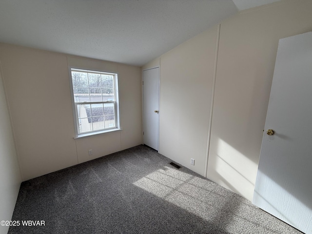 unfurnished bedroom with carpet flooring