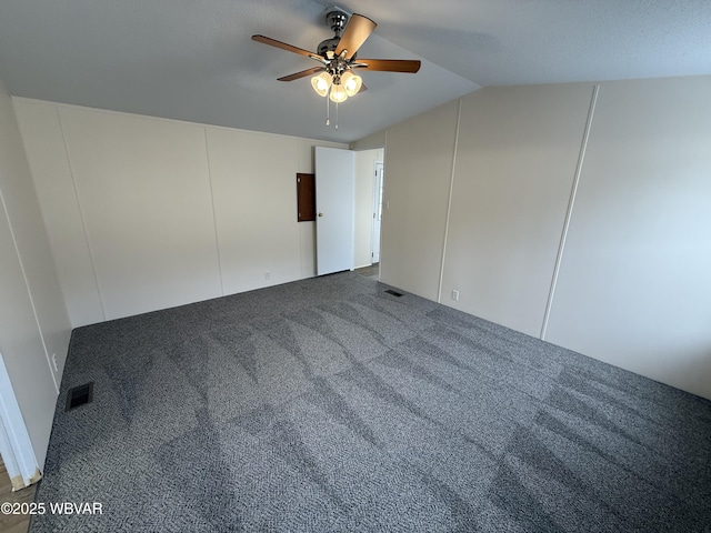 unfurnished room featuring carpet flooring, ceiling fan, and lofted ceiling