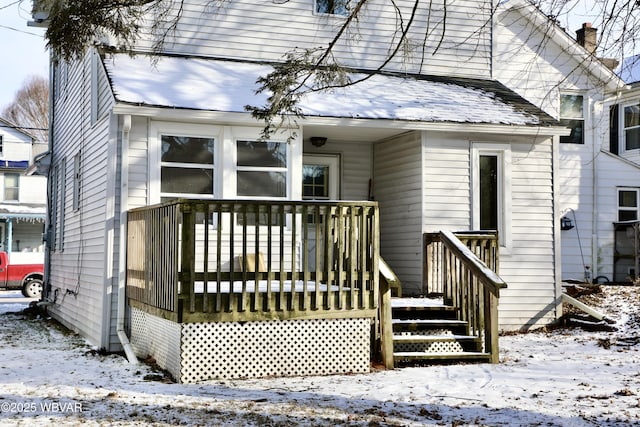 view of snow covered property