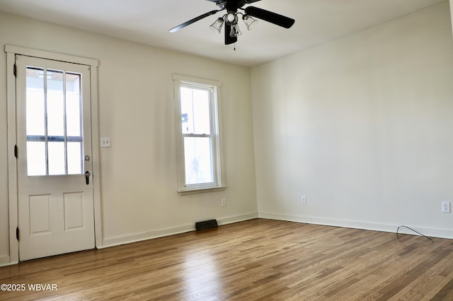 entrance foyer featuring ceiling fan and light hardwood / wood-style flooring