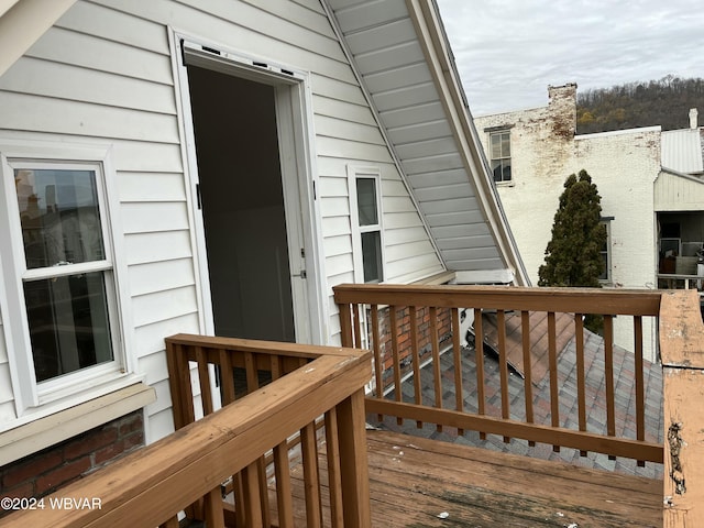 entrance to property with a wooden deck