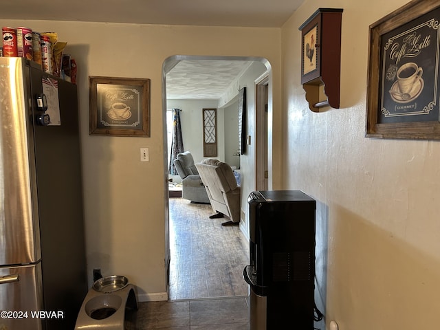 hall with dark wood-type flooring