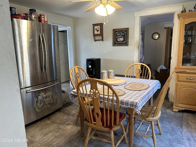 dining space featuring ceiling fan