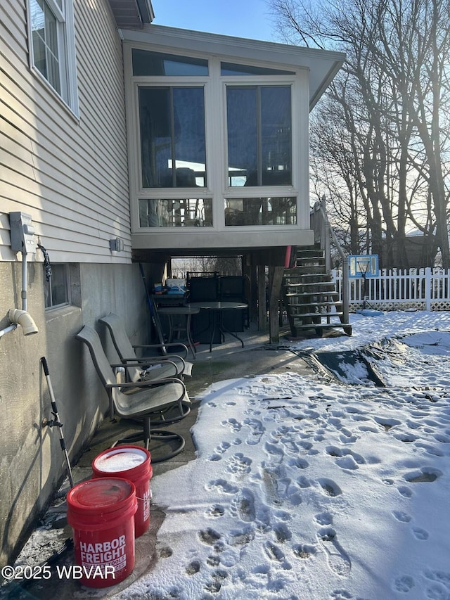 view of snow covered patio