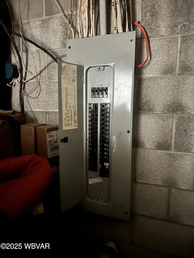 utility room featuring electric panel