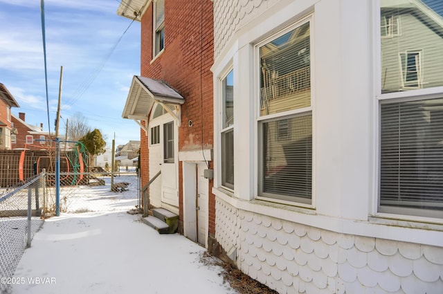 view of snow covered property