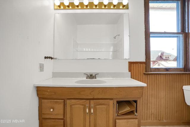 bathroom with vanity and toilet