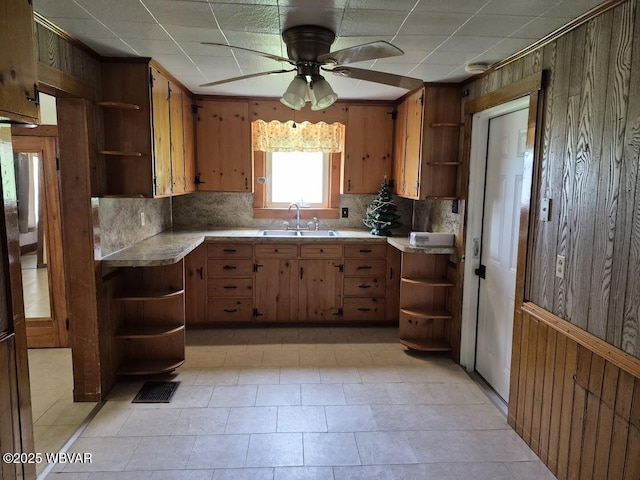1358 W Valley Rd, Loganton, PA 17747 - kitchen with wooden walls, a sink, and open shelves