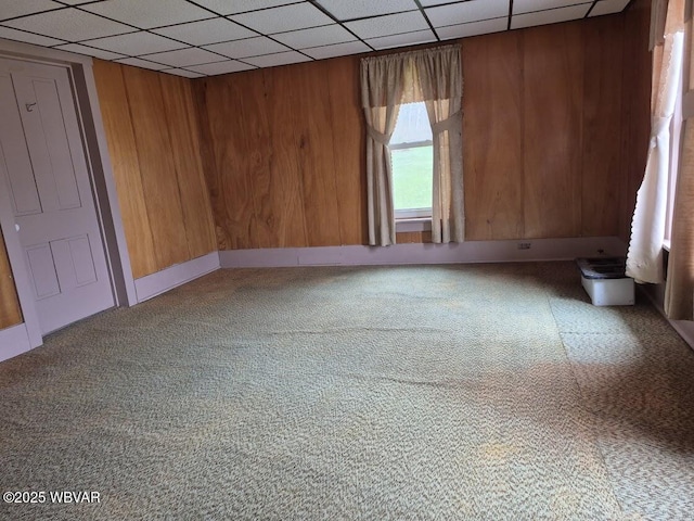 1358 W Valley Rd, Loganton, PA 17747 - unfurnished room featuring wooden walls, a drop ceiling, and carpet floors