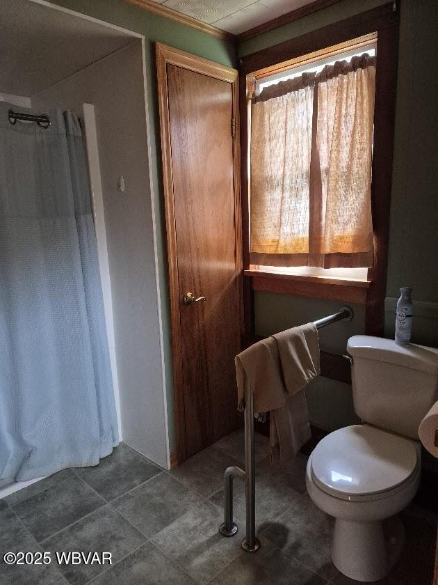 1358 W Valley Rd, Loganton, PA 17747 - full bath featuring tile patterned floors, a shower with curtain, and toilet