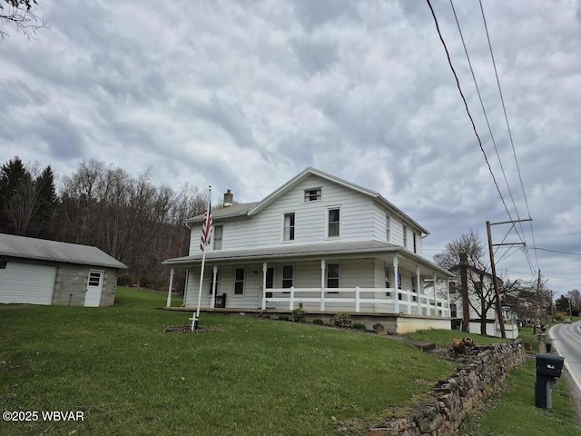 1358 W Valley Rd, Loganton, PA 17747 - farmhouse inspired home featuring an outdoor structure, a chimney, a front lawn, and covered porch