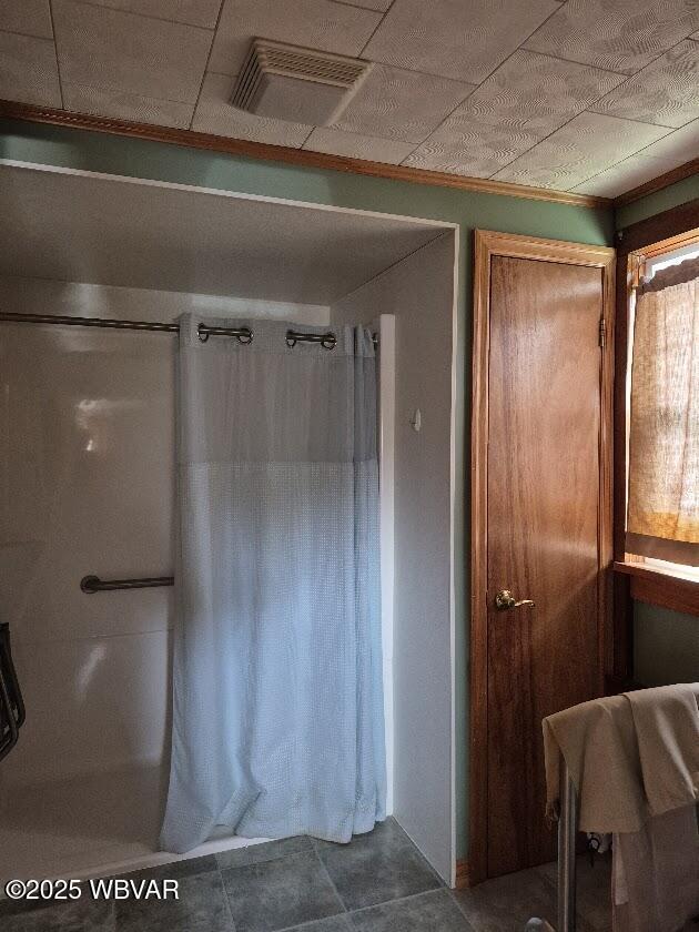 1358 W Valley Rd, Loganton, PA 17747 - bathroom featuring visible vents, tile patterned flooring, and a shower with curtain