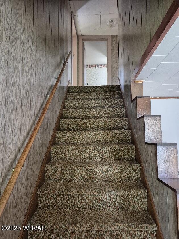 1358 W Valley Rd, Loganton, PA 17747 - staircase with wood walls