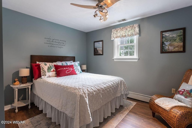 bedroom featuring ceiling fan, dark hardwood / wood-style flooring, and a baseboard radiator