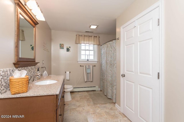 bathroom featuring vanity, a baseboard radiator, toilet, and tasteful backsplash