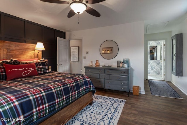 bedroom featuring ceiling fan and dark wood-type flooring