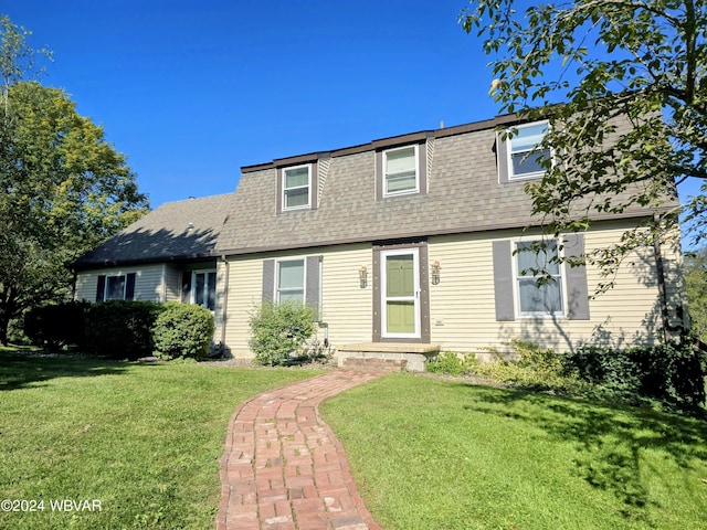 view of front of home with a front yard