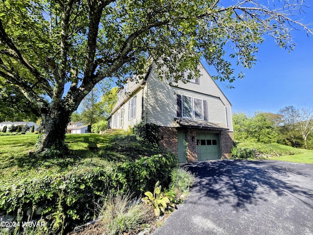 view of home's exterior with a garage