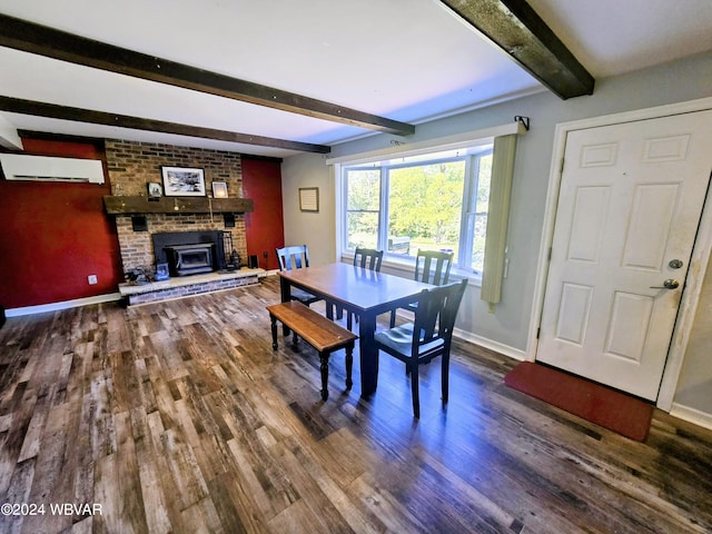 dining space featuring a wall mounted air conditioner, beam ceiling, and hardwood / wood-style flooring