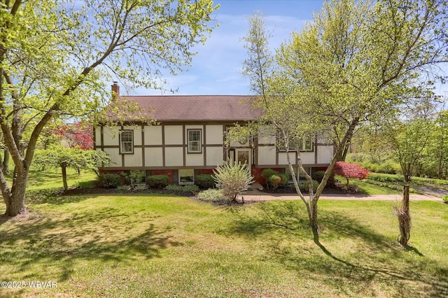 6553 Jacks Hollow Rd, Williamsport, PA 17702 - view of front of house featuring roof with shingles, a chimney, and a front yard