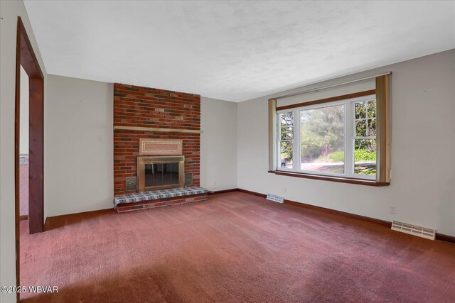 6553 Jacks Hollow Rd, Williamsport, PA 17702 - unfurnished living room featuring visible vents, carpet, a brick fireplace, and baseboards