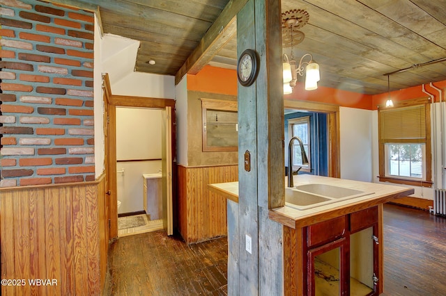 320 E Central Ave, Jersey Shore, PA 17740 - kitchen with a sink, a wainscoted wall, dark wood-type flooring, pendant lighting, and radiator heating unit