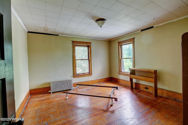 320 E Central Ave, Jersey Shore, PA 17740 - exercise room with radiator, ornamental molding, hardwood / wood-style floors, and baseboards