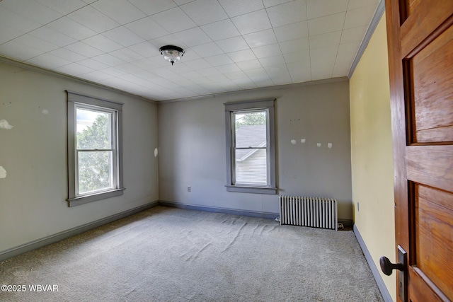 320 E Central Ave, Jersey Shore, PA 17740 - carpeted empty room featuring radiator heating unit, ornamental molding, and baseboards