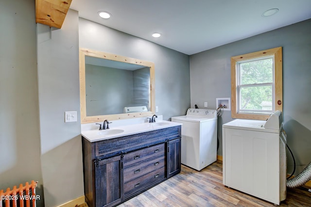 320 E Central Ave, Jersey Shore, PA 17740 - washroom with washing machine and dryer, wood finished floors, and recessed lighting