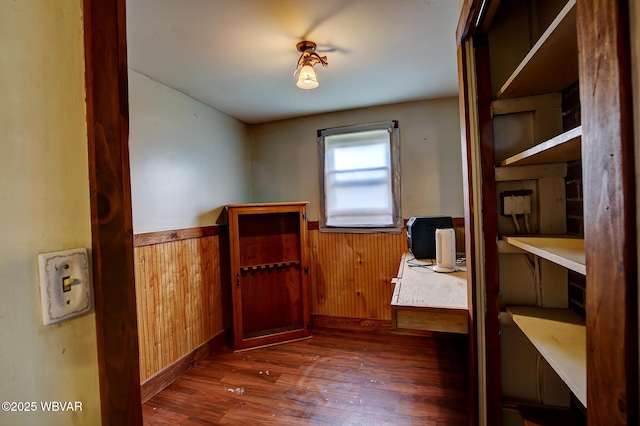 320 E Central Ave, Jersey Shore, PA 17740 - doorway to outside featuring wood-type flooring, wainscoting, and wooden walls