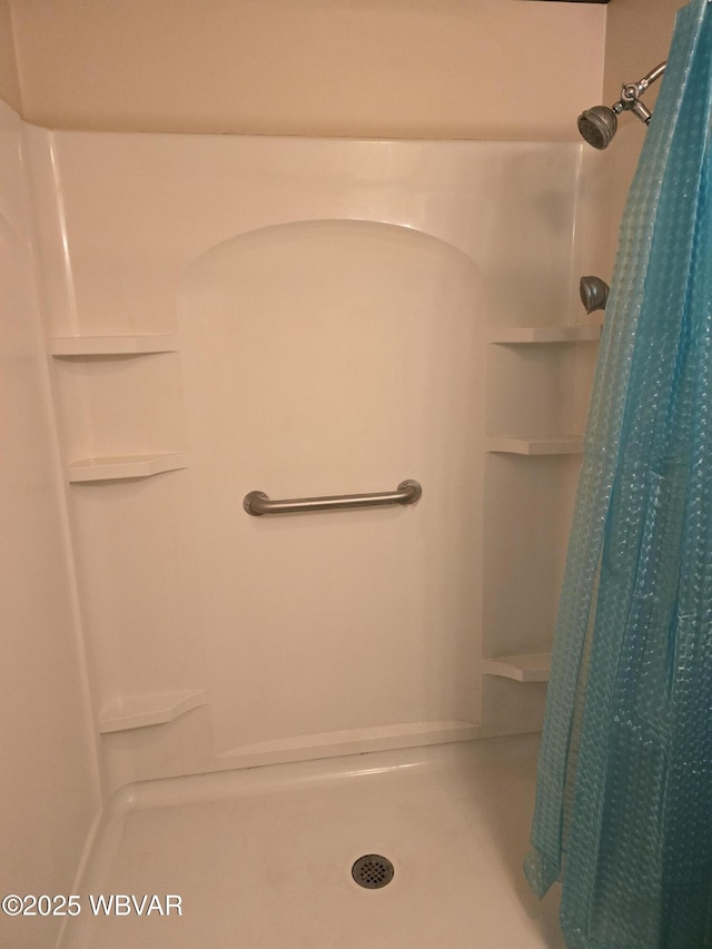 bathroom featuring a stall shower