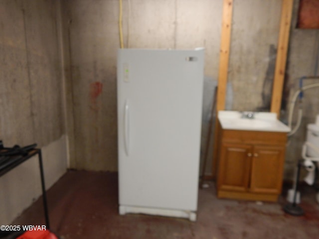 basement with freestanding refrigerator