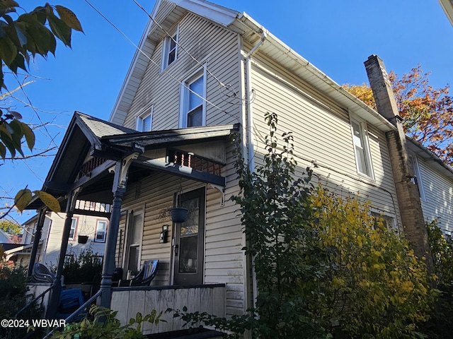 view of home's exterior with covered porch