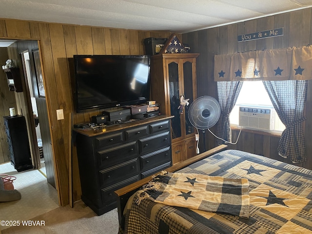 bedroom featuring light colored carpet, cooling unit, and wood walls