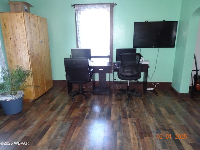 office space with dark hardwood / wood-style flooring