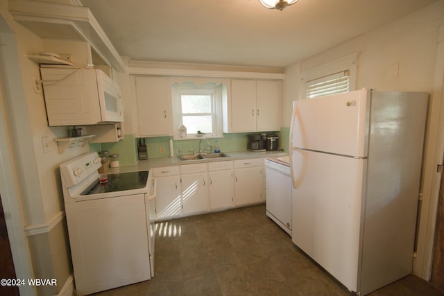 kitchen featuring white cabinets, white appliances, backsplash, and sink