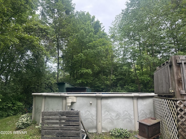 207 Bald Eagle Forest Rd, Blanchard, PA 16826 - rear view of house featuring stucco siding