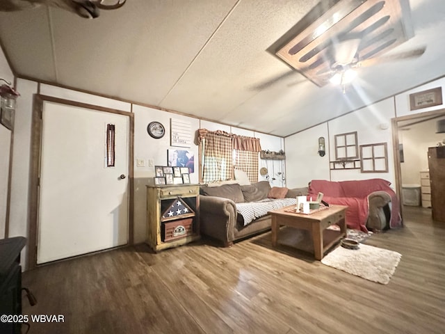 207 Bald Eagle Forest Rd, Blanchard, PA 16826 - living room featuring a ceiling fan, wood finished floors, and vaulted ceiling