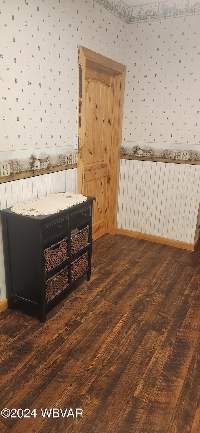 bedroom featuring dark hardwood / wood-style flooring