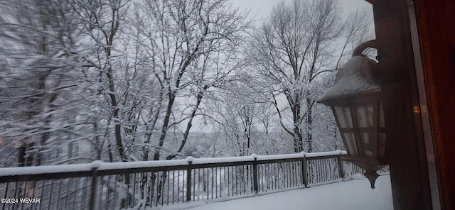 view of snow covered deck