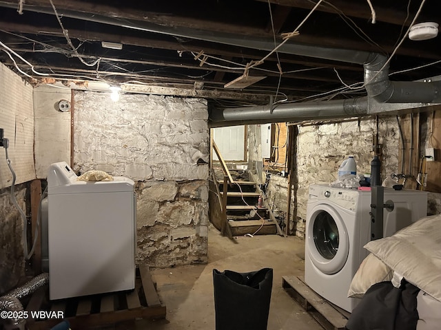 basement featuring washer and clothes dryer