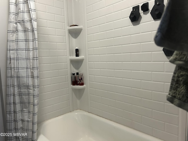 bathroom featuring shower / tub combo with curtain