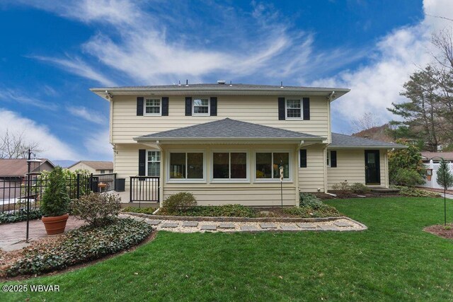 2528 N Hills Dr, Williamsport, PA 17701 - rear view of house featuring fence and a lawn