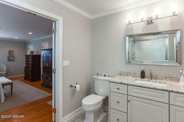 2528 N Hills Dr, Williamsport, PA 17701 - bathroom with baseboards, toilet, crown molding, vanity, and wood finished floors