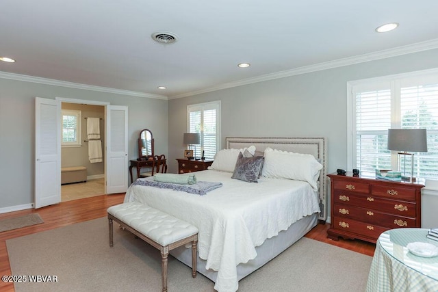 2528 N Hills Dr, Williamsport, PA 17701 - bedroom with ornamental molding, visible vents, baseboards, and wood finished floors