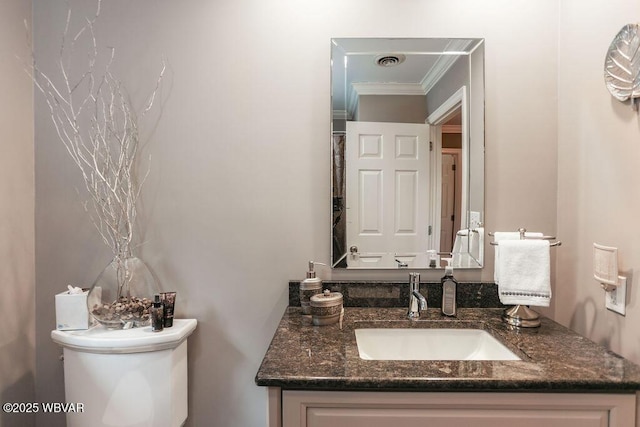 2528 N Hills Dr, Williamsport, PA 17701 - bathroom with crown molding, visible vents, toilet, and vanity