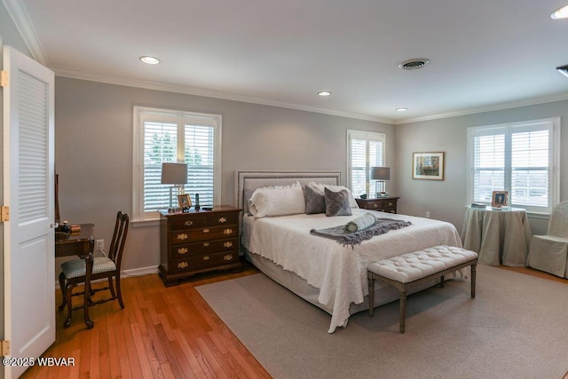 2528 N Hills Dr, Williamsport, PA 17701 - bedroom featuring hardwood / wood-style floors, visible vents, and ornamental molding